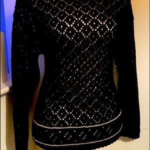 Sweaters are 20.00 each, handbag 5.00,earrings 2.